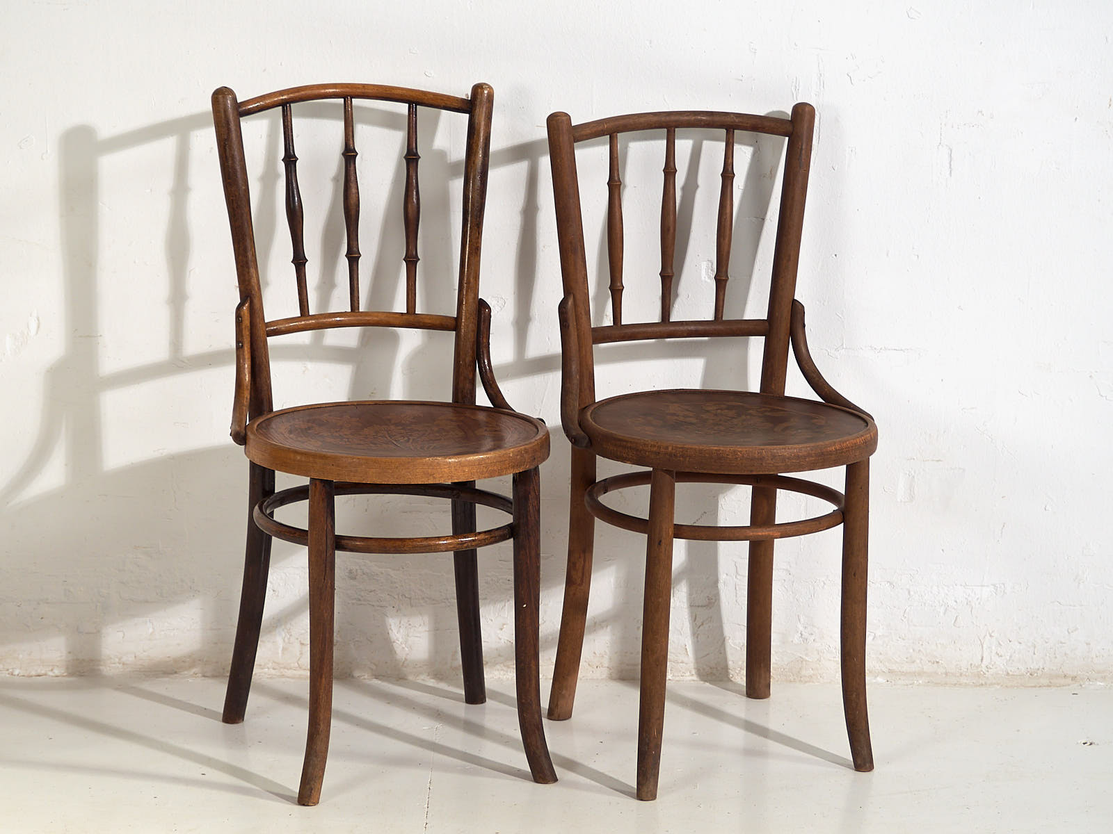 Antique Parisian cafe style wooden chairs (c.1920)