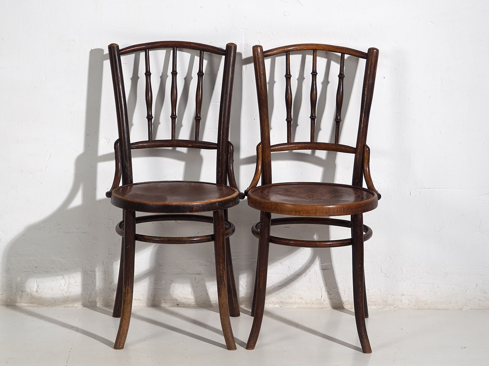 Antique Parisian cafe style wooden chairs (c.1920)