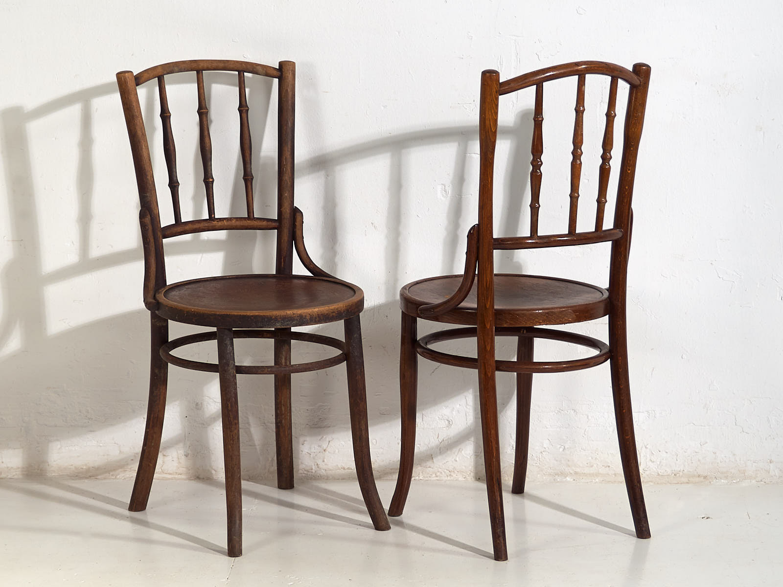 Antique Parisian cafe style wooden chairs (c.1920)